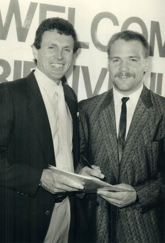 Meeting a legend: Wendel Clark, right, a hot prospect for Canada Cup '87, talks with Paul Henderson, the hero of the celebrated 1972 series with the Soviet Union that Canada just barely won