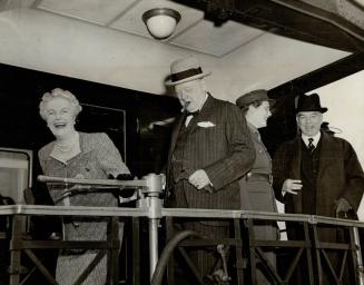 A Happy wife and mother welcomes Mr. Churchill and Mary back to Quebec after trip to see Roosevelt