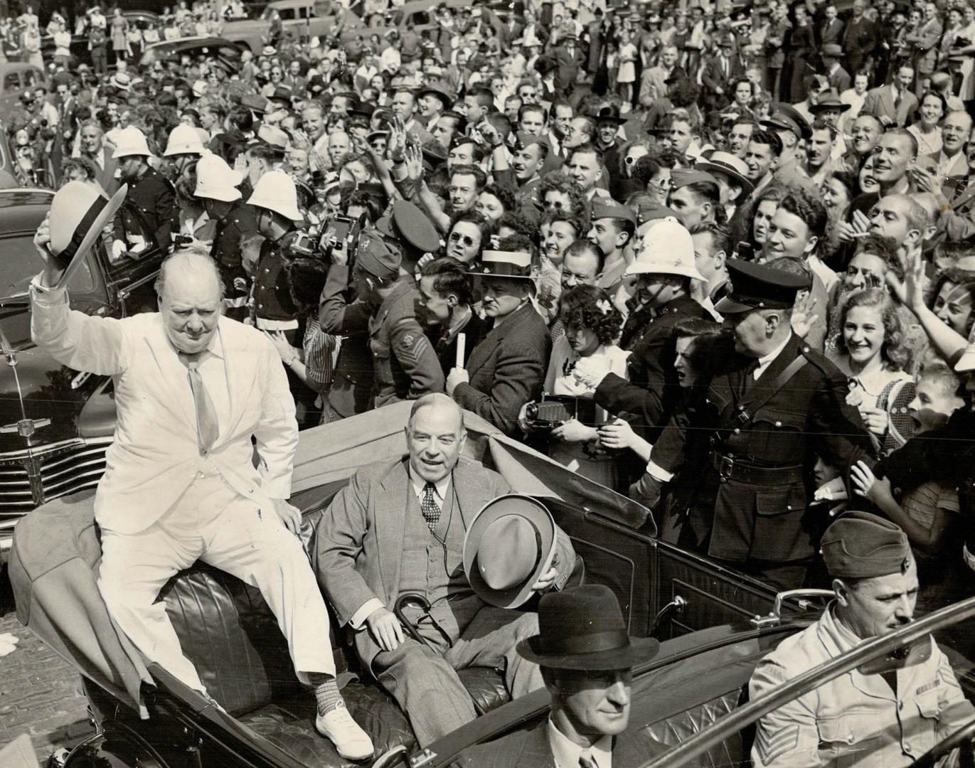 All-out for empire leader as he tours city streets with premier king in first public appearance