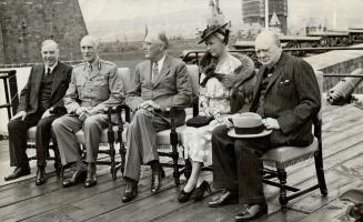 Eager news photographers had a veritable field day after President Roosevelt's arrival in Quebec, when the chief conferees and their hosts in Canada p(...)
