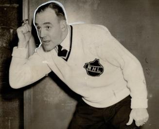 Montreal, Jan. 10 - (CP) - An unknown hoodlum fan in Montreal Forum Saturday night heaved an empty whiskey bottle at Referee King Clancy just as the D(...)