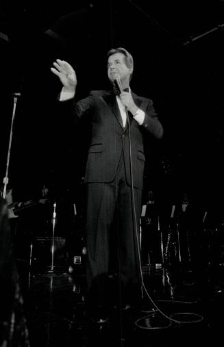 Left, on-stage and looking everyouthful is the world's oldest teenager, Dick Clark