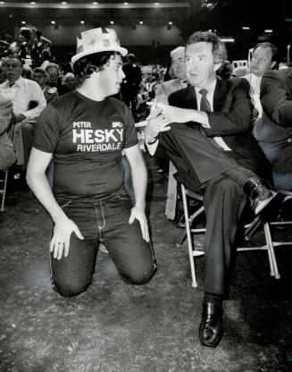 Political chat: Conservative Leader Joe Clark, talking to a supporter of defeated candidate Peter Hesky, told the crowds Broadview-Greenwood would be step to ousting Liberals