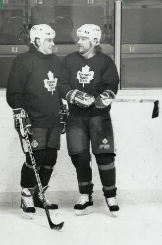 Masterton Candidate: Wendel Clark, talking with Peter Zezel, was selected for his perserverance in overcoming injury and his dedication to hockey