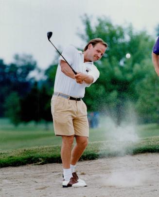 Happy to be Leaf: Free agent Wendel Clark, golfing yesterday at the Wendel Clark Celebrity Golf Tournament, doesn't want to leave to Leafs