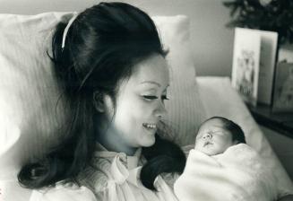 Adrienne Clarkson is shown in Toronto General Hospital with her three-day-old daughter, Kyra