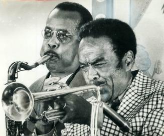 Out of Retirement after 9 years, trumpeter Buck Clayton (right) joined tenor saxophonist Buddy Tate with a comeback performance at the Westbury Hotel (...)