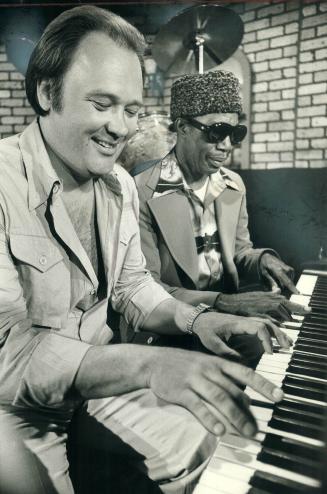 Professor Longhair, a jazz legend from New Orleans (right), yesterday met the man who had written a song about him that he'd never heard. David Clayto(...)