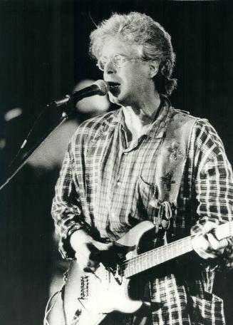Under a pearl moon: Canadian singer Bruce Cockburn's mystic Christianity and anti-war, reggae-influenced songs were an eerie reflection of his Jamaican audience's simple faith and rustic traditions