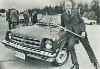 Strong competition for imports is the reason behind the design of the Chevrolet Chevette - here being shown by General Motors of Canada president Davi(...)