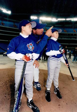 Roger Clemens with sons Koby, left, and Kory