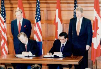 Standing Jean Chretien, Bill Clinton, Douglas Young and Federico Pena