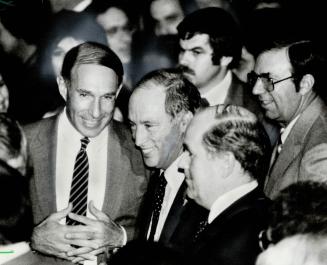 Well-wishers: George Cohon of McDonald's (clasped hands) was one of 1,600 people who turned out to hear Prime Minister Pierre Trudeau speak at a $185-a-plate Liberal fund-raising dinner