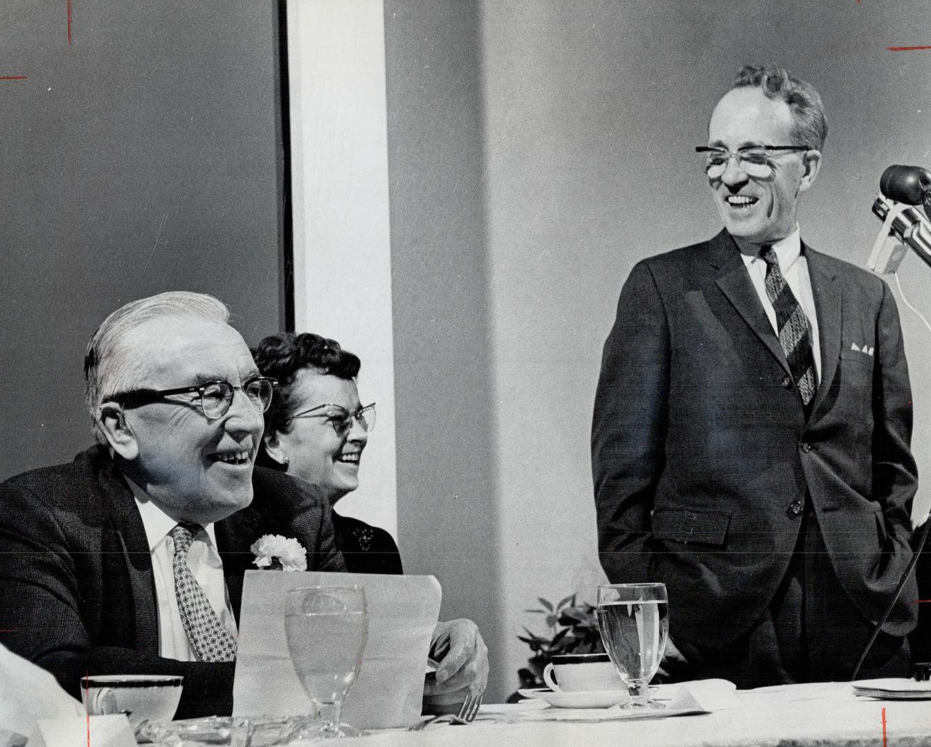M. J. Coldwell (left), Mrs. Douglas and Tommy Douglas