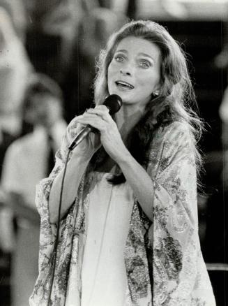 Sweet sound: Judy Collins fans - more than 8,000 of them - ignored the near-30C temperature and humid air to pay homage to the well-loved singer who appeared at The Forum at Ontario Place