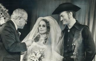 Happiest moment of my life, says Stompin' Tom Connors as he weds Lena Welsh, 26 Magdalen Islands barmaid, on Elwood Glovers TV show, Luncheon Date tod(...)