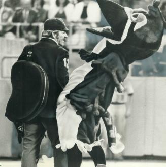 Instant replay? Blue Jay mascot went for a dash around the bases between innings and umpire Terry Cooney played along, thumbing the furry fowl after a(...)