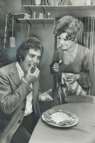 Burlesque star Ann Corio likes to prepare meals in her apartment hotel when she is on tour