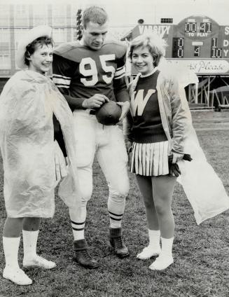 Lead in 'Mudbowl'. Almost prophetic were these pre-game good wishes for Western's great fullback Lionel Conacher from Marg Jackson and Carol Marshall.(...)