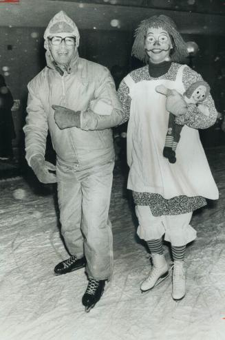 Skating in the New Year at Scarborough Civic Centre, Mayor Paul Cosgrove does a turn with Margaret Luxton of Scarborough Corps of Clowns, out celebrat(...)
