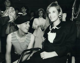Wendy Crawford, spokesman for the attorney-genral's Countermeasures Against Drinking And Driving, watches the competitive dressers with Chanel addict Jean-Charles Bourgeois