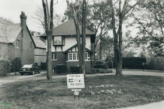 Creighton home: A for sale sign stands in front of the Toronto house of Doug Creighton, left, a co-founder of The Sun who was ousted this week