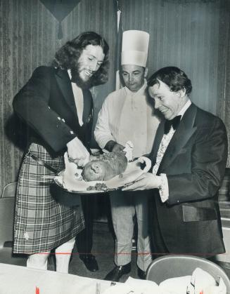 Crombie Grimaces over the Haggis