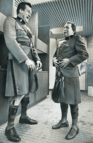 The long and short of it. As an associate member of the Toronto Scottish militia regiment officers' mess, Toronto Mayor David Crombie, who's 5-feet-6,(...)