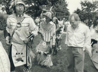 A multicutural surprise. Multiculturalism Minister David Crombie, hosting his annual strawberry festival in a downtown Toronto park, was given a taste(...)