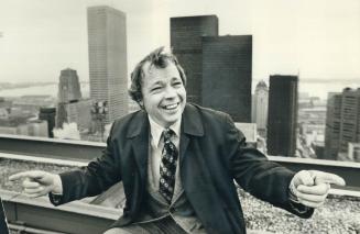 Mayor David Crombie is shown atop City Hall with what he calls boxes in the background