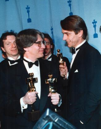 David Cronenberg, left, named best director last night, shares a moment of triumph backstage with Jeremy Irons, names best actor, after their psycholo(...)