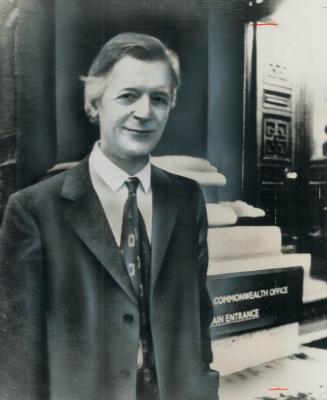 Showing up for work, British diplomat James Cross, freed after being held hostage for 60 days by Quebec FLQ terrorists, leaves Foreign Office in Londo(...)