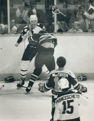 Toronto Maple Leafs Wendel Clark, left, appears to score on Detroit Red  Wings goalie Tim Cheveldae but he goal was overturned by officials during  the first period during the fifth game of