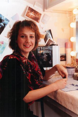 Busy, busy: Susan Cuthbert's juggling role of Christine in Phantom with time for her daughter and rehearsals for The Music of Andrew Lloyd Webber