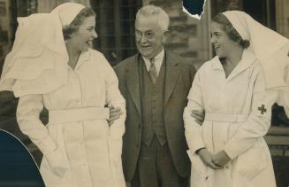 Peggy Taylor and Marjorie Dineen of Toronto, right, who assisted in the recent Red Cross campaign, meet Doctor Dafoe at a gathering of the society held in Government House