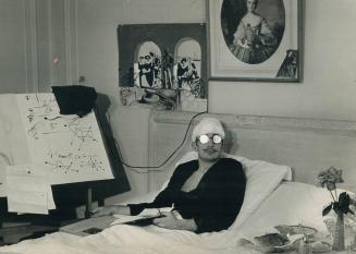 Right, eccentric but brilliant surrealist Salvador Dali is waiting for inspiration at his drawing board