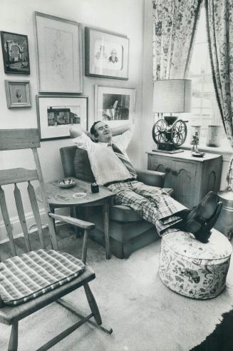 Bert Danson, brother of York Mills MP Barney Danson, relaxes in living-room of the Danson home