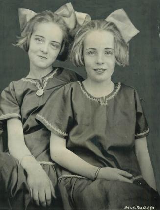 Bette Davis, LEFT, with her sister, Bobbie, in the prankish days when she begged to be taken to the movies, never dreaming that she would one day become a star
