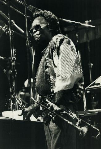 Wonderfully musical: Miles Davis is a man who doesn't like to be photographed, and last night at Massey Hall was no exception