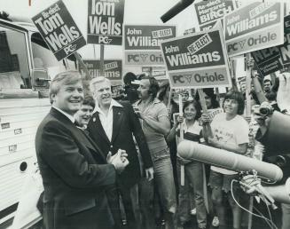 Premier Williams Davis, his wife Kathy and Education Minister Thomas Wells were greeted by supporters outside CFTO-TV studios where last night's debat(...)