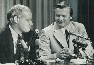 Allan Lawrence, justice secretary in the cabinet of Premier William Davis (right), announced his resignation from both the cabinet and as an MPP to ru(...)