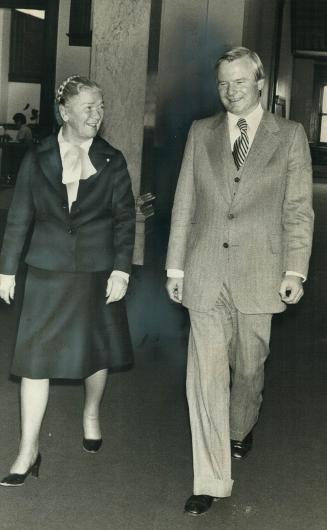 A smiling Bill Davis takes an amiable walk today at Queen's Park with Lieutenaut-Governor Pauline McGibbon