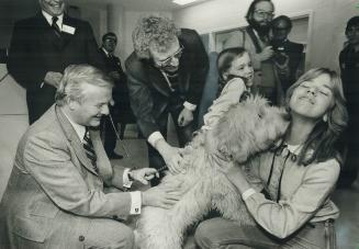 Short stay for Bonch. While Premier William Davis (left) and Toronto Mayor Art Eggleton look on, Bonch, a 5-month-old terrier-border collie crossbreed(...)