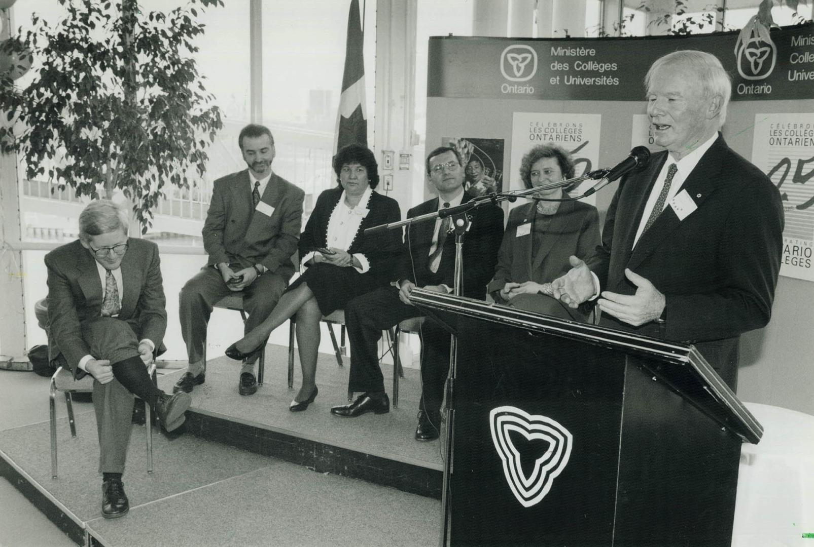 Premier's Awards: Premier Bob Rae pulls up his socks as, from left, winners Fernand Hamelin, Mae Katt, Andrew Faas and Mary Jonik listen to former premier Bill Davis at awards luncheon yesterday