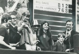 Family of new premier of Ontario, William Davis, stands with him in his moment of triumph last night at Maple Leaf Gardens. From left are: his wife, K(...)