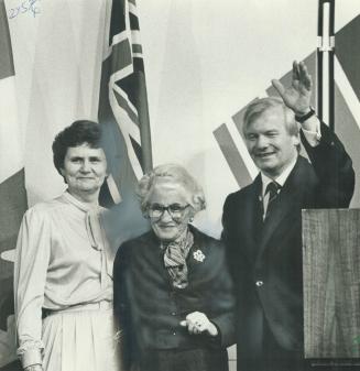At son's side: A proud Vera Mildred Davis beams as son Premier William Davis acknowledges his election victory at a rally March 19