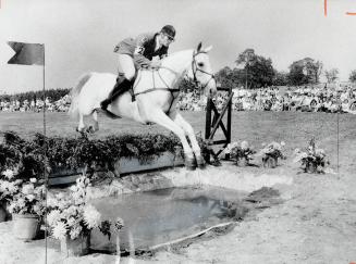 Jim Day of Hornby, Ont., guides The Nomad over a jump en route to winning the first North American three-day event championship at Jokers Hill yesterd(...)
