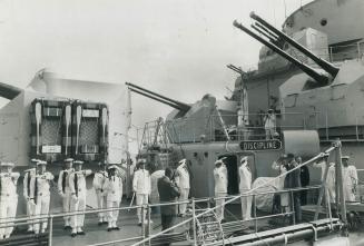 A salute is taken by President de Gaulle from the crew and officers of the French warship Colbert, which had just docked at Quebec city in 1967. The f(...)