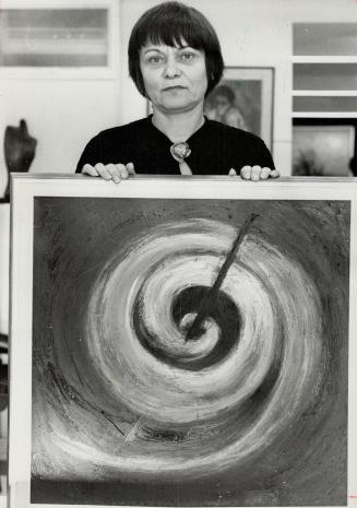 Helen (Bobbi) De Silaghi. With her painting of universal chart