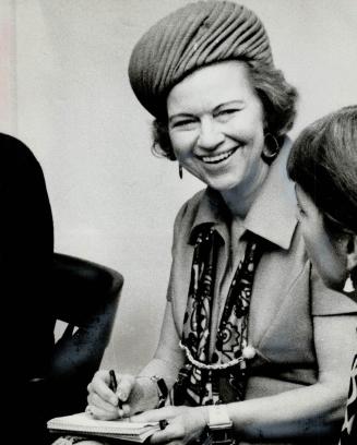 Several hours of exposure to Marshall McLuhan (left) gave Star columnist Lotta Dempsey (right) a sense of having been led from a hall of crazy mirrors(...)